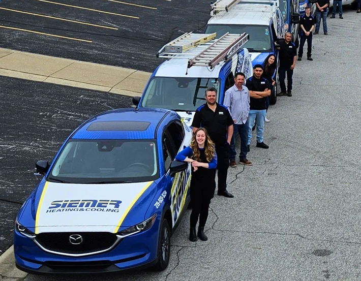 Siemer team in front of vans