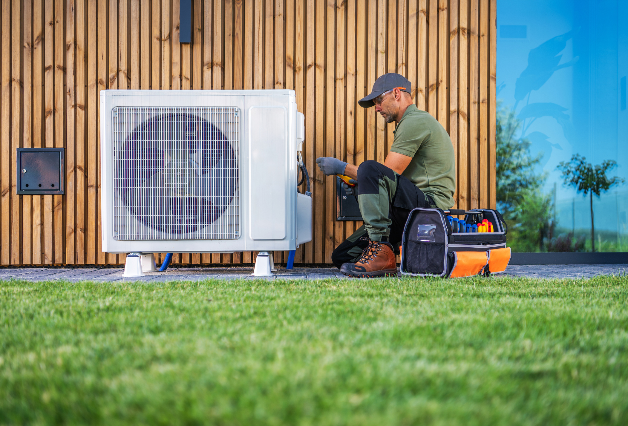 A technician is servicing a Heat Pump